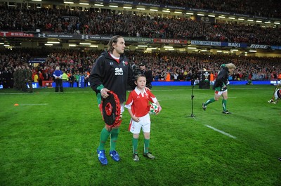 07.11.09 - Wales v New Zealand - Invesco Perpetual Series 2009 - Wales captain Ryan Jones leads out his team with mascot Jack Egan. 