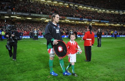 07.11.09 - Wales v New Zealand - Invesco Perpetual Series 2009 - Wales captain Ryan Jones leads out his team with mascot Jack Egan. 