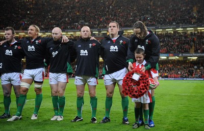 07.11.09 - Wales v New Zealand - Invesco Perpetual Series 2009 - Matthew Rees, Andy Powell, Tom Shanklin, Martyn Williams, Gethin Jenkins, Ryan Jones and mascot Jack Egan line up for the anthems. 