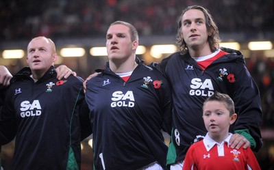 07.11.09 - Wales v New Zealand - Invesco Perpetual Series 2009 - Martyn Williams, Gethin Jenkins, Ryan Jones and mascot Jack Egan line up for the anthems. 