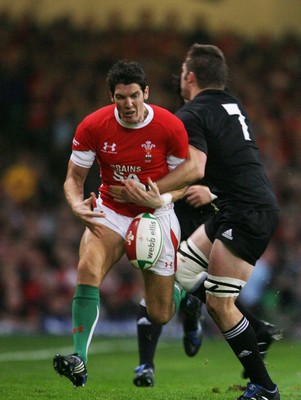 07.11.09  Wales v New Zealand... Wales James Hook is tackled by Richie McCaw 