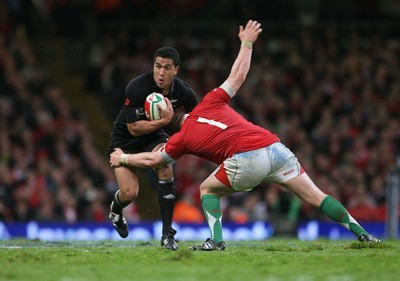 07.11.09  Wales v New Zealand... Mils Muliaina is tackled by Gethin Jenkins. 