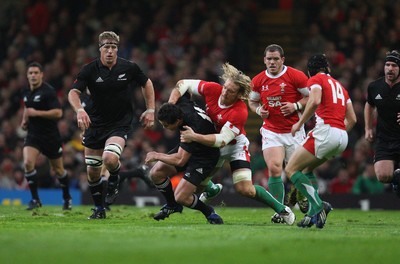 07.11.09... Wales v New Zealand, Invesco Perpetual Series All Blacks Zac Guildford is tackled by Andy Powell 