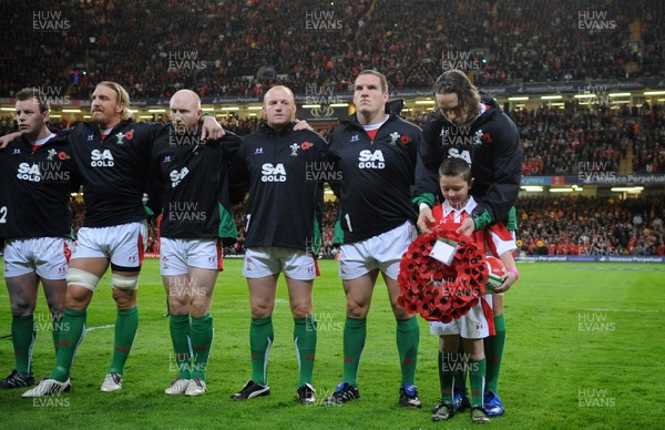 07.11.09 - Wales v New Zealand - Invesco Perpetual Series 2009 - Matthew Rees, Andy Powell, Tom Shanklin, Martyn Williams, Gethin Jenkins, Ryan Jones and mascot Jack Egan line up for the anthems. 