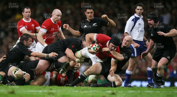 07.11.09  Wales v New Zealand... Wales Luke Charteris is tackled by Brendon Leonard. 
