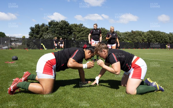 161022 - Wales v New Zealand, Women’s Rugby World Cup 2021, Pool A - Sisilia Tuipulotu of Wales and Caryl Thomas of Wales warm up ahead of their match against New Zealand