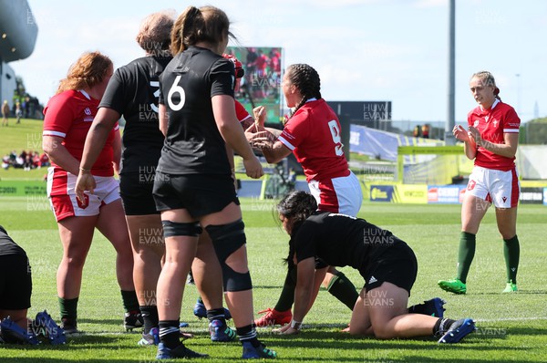 161022 - Wales v New Zealand, Women’s Rugby World Cup 2021, Pool A - Ffion Lewis of Wales celebrates after she powers over to score try