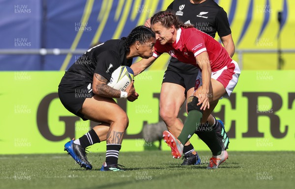 161022 - Wales v New Zealand, Women’s Rugby World Cup 2021, Pool A - Jasmine Joyce of Wales tackles Renee Wickliffe of New Zealand