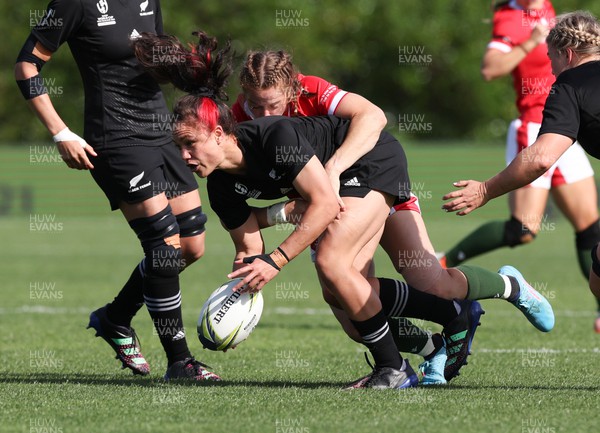 161022 - Wales v New Zealand, Women’s Rugby World Cup 2021, Pool A - Ruby Tui of New Zealand is tackled by Lisa Neumann of Wales