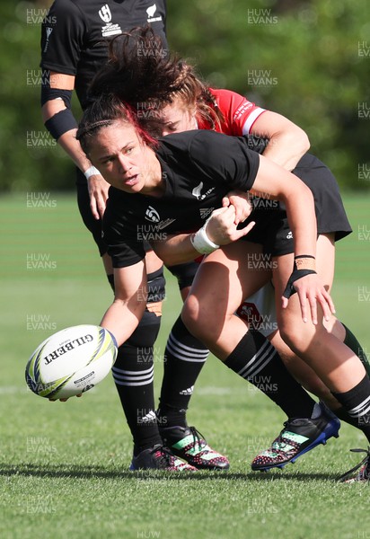 161022 - Wales v New Zealand, Women’s Rugby World Cup 2021, Pool A - Ruby Tui of New Zealand is tackled by Lisa Neumann of Wales