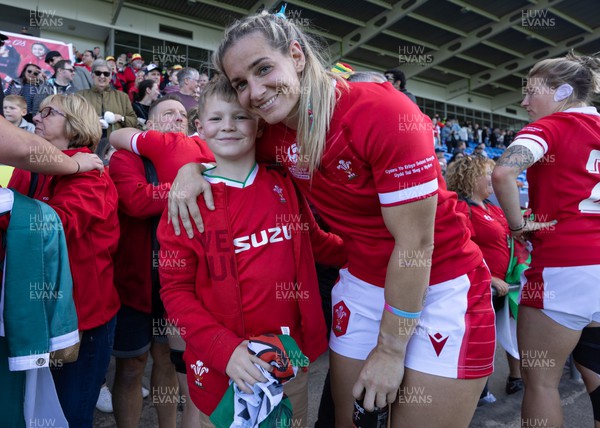 161022 - Wales v New Zealand, Women’s Rugby World Cup 2021, Pool A - Kerin Lake of Wales with her son Jacob at the end of the match 