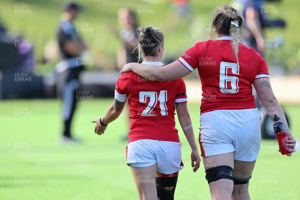 161022 - Wales v New Zealand, Women’s Rugby World Cup 2021, Pool A - Keira Bevan of Wales, left, and Gwen Crabb of Wales at the end of the match