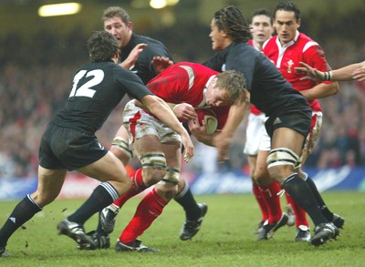 20.11.04...Wales v New Zealand, Millennium Stadium, Cardiff  Wales' Dafydd Jones charges into the All Blacks defence  