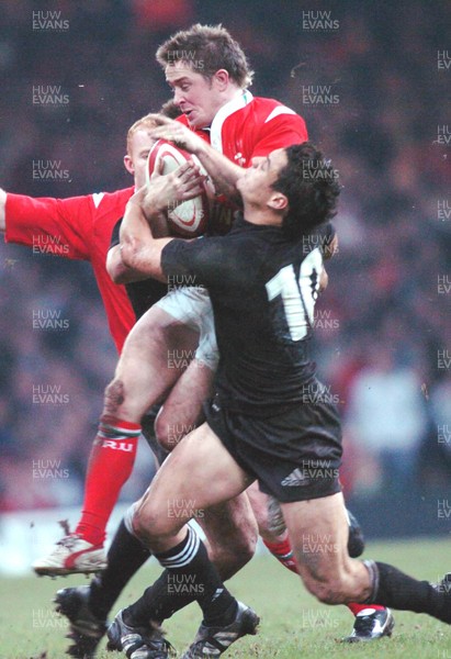 20-11-04. Wales v New Zealand   Wales' Rhys Williams is caught by Daniel Carter.  
