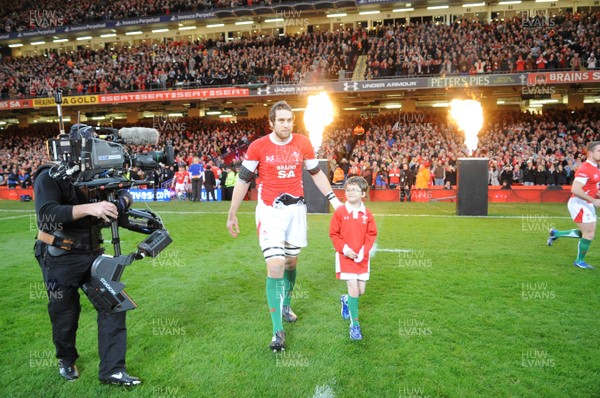 22.11.08 - Wales v New Zealand - Invesco Perpetual Series 2008 - Wales captain Ryan Jones leads out his team with mascot Jacob Wickstead. 