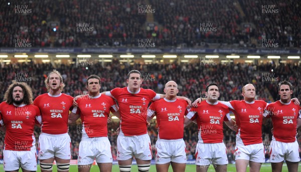 22.11.08 - Wales v New Zealand - Invesco Perpetual Series 2008 - Wales' Adam Jones, Alun Wyn Jones, Jamie Roberts, Ian Evans, Tom Shanklin, Stephen Jones, Martyn Williams and Lee Byrne lines up for the national anthems. 