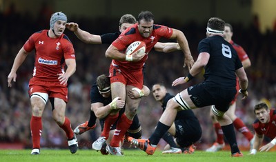 221114 - Wales v New Zealand All Blacks - Dove Men Care -Jamie Roberts of Wales is tackled by Wyatt Crockett of New Zealand