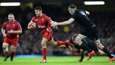 221114 - Wales v New Zealand All Blacks - Dove Men Care -Rhys Webb of Wales is tackled by Owen Franks and Brodie Retallick of New Zealand