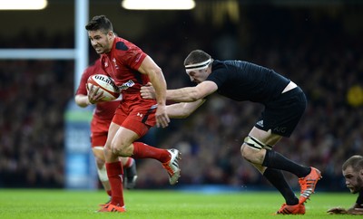 221114 - Wales v New Zealand All Blacks - Dove Men Care -Rhys Webb of Wales is tackled by Brodie Retallick of New Zealand