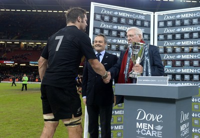 221114 - Wales v New Zealand All Blacks - Dove Men Care -Richie McCaw of New Zealand lifts the winners trophy