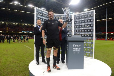 221114 - Wales v New Zealand All Blacks - Dove Men Care -Richie McCaw of New Zealand lifts the winners trophy