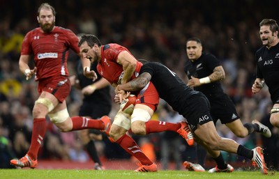 221114 - Wales v New Zealand All Blacks - Dove Men Care -Sam Warburton of Wales is tackled by Charles Piutau of New Zealand