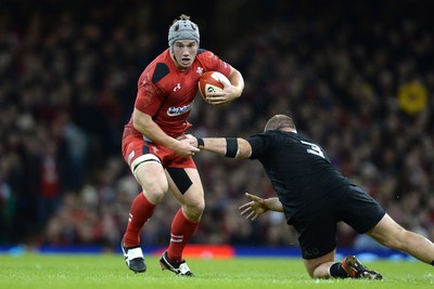 221114 - Wales v New Zealand All Blacks - Dove Men Care -Jonathan Davies of Wales is tackled by Owen Franks of New Zealand