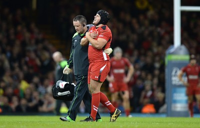 221114 - Wales v New Zealand All Blacks - Dove Men Care -Nicky Smith of Wales leave the field with Doctor Geoff Davies