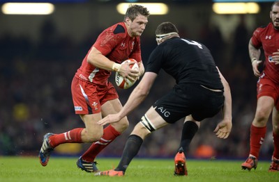 221114 - Wales v New Zealand All Blacks - Dove Men Care -Dan Biggar of Wales takes on Brodie Retallick of New Zealand