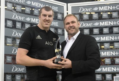 221114 - Wales v New Zealand All Blacks - Dove Men Care -Brodie Retallick of New Zealand is presented with IRB Player of the year award from Scott Quinnell