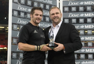 221114 - Wales v New Zealand All Blacks - Dove Men Care -Richie McCaw of New Zealand is presented with IRB Team of the year award from Scott Quinnell