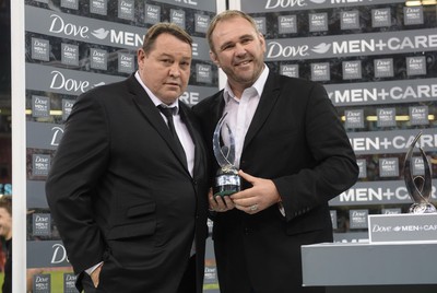 221114 - Wales v New Zealand All Blacks - Dove Men Care -Steve Hansen of New Zealand is presented with IRB Coach of the year award from Scott Quinnell