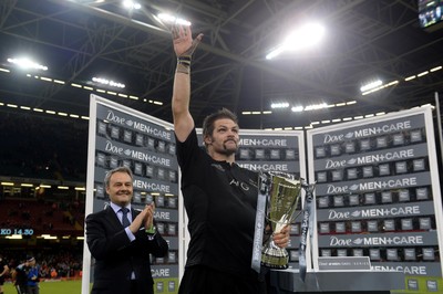 221114 - Wales v New Zealand All Blacks - Dove Men Care -Richie McCaw of New Zealand lifts the winners trophy