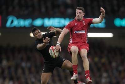 221114 - Wales v New Zealand - Dove Men Series 2014 - Julian Savea of New Zealand and Alex Cuthbert of Wales jump for the ball