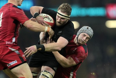 221114 - Wales v New Zealand - Dove Men Series 2014 - Kieran Read of New Zealand is tackled by Jonathan Davies of Wales 