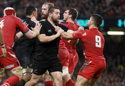 221114 - Wales v New Zealand - Dove Men Series 2014 - Dane Coles of New Zealand and Rhys Webb of Wales exchange blows