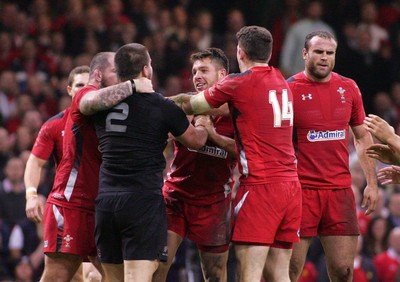 221114 - Wales v New Zealand - Dove Men+Care Series - Dane Coles of New Zealand squares up to Rhys Webb of Wales