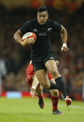 221114 -  Wales v New Zealand, Dove Men Series 2014, Cardiff - Julian Savea of New Zealand is ankle tap tackled by Dan Biggar of Wales as he tries to break away