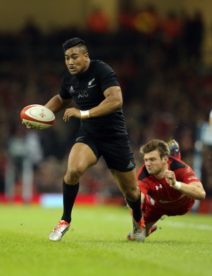 221114 -  Wales v New Zealand, Dove Men Series 2014, Cardiff - Julian Savea of New Zealand is ankle tap tackled by Dan Biggar of Wales as he tries to break away