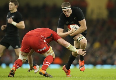 221114 -  Wales v New Zealand, Dove Men Series 2014, Cardiff - Brodie Retallick of New Zealand is tackled by Jake Ball of Wales 