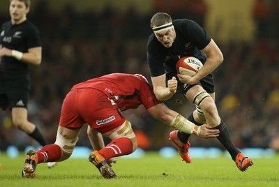 221114 -  Wales v New Zealand, Dove Men Series 2014, Cardiff - Brodie Retallick of New Zealand is tackled by Jake Ball of Wales 