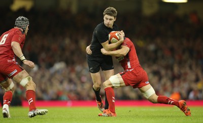 221114 -  Wales v New Zealand, Dove Men Series 2014, Cardiff - Beauden Barrett of New Zealand is tackle by Dan Lydiate of Wales and Sam Warburton of Wales   