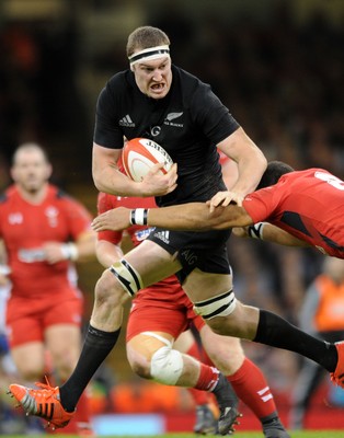 221114 - Wales v New Zealand - Dove Men+Care Series - Brodie Retallick of New Zealand is tackled by Taulupe Faletau of Wales