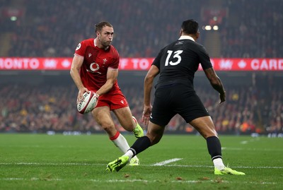 221125 - Wales v New Zealand All Blacks - Quilter Nations Series - Max Llewellyn of Wales is challenged by Rieko Ioane of New Zealand 