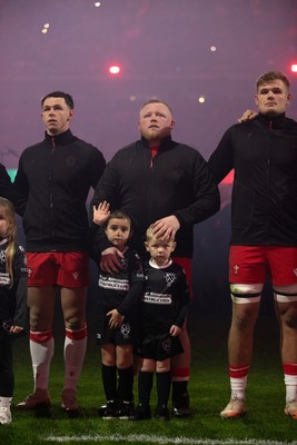 221125 - Wales v New Zealand All Blacks - Quilter Nations Series - Keiron Assiratti of Wales with his children during the anthem