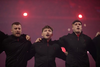 221125 - Wales v New Zealand All Blacks - Quilter Nations Series - Harri Deaves, Dan Edwards and Morgan Morse of Wales during the anthem