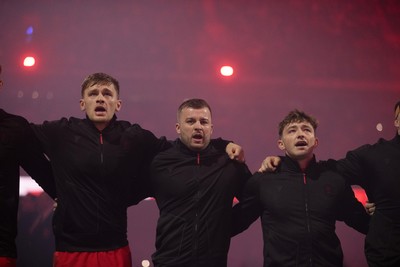 221125 - Wales v New Zealand All Blacks - Quilter Nations Series - Alex Mann, Harri Deaves and Dan Edwards of Wales during the anthem