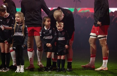221125 - Wales v New Zealand All Blacks - Quilter Nations Series - Keiron Assiratti of Wales with his children during the anthem