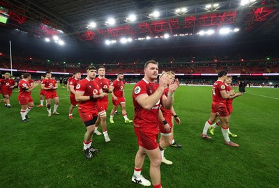 221125 - Wales v New Zealand, Quilter Nations Series - Dewi Lake of Wales leads the applause for the fans as the players make their way around the pitch at the end of the match
