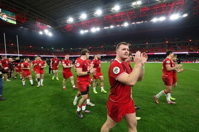 221125 - Wales v New Zealand, Quilter Nations Series - Dewi Lake of Wales leads the applause for the fans as the players make their way around the pitch at the end of the match
